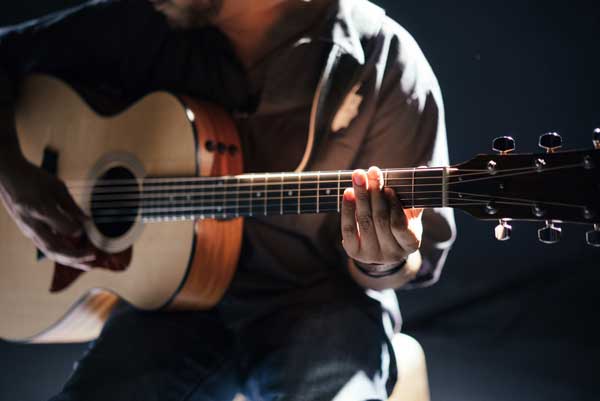 close up of a guitarist